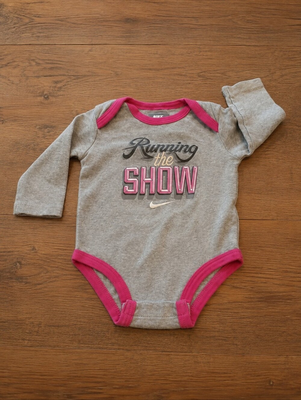 Size 3-6 months baby girls Nike onesie